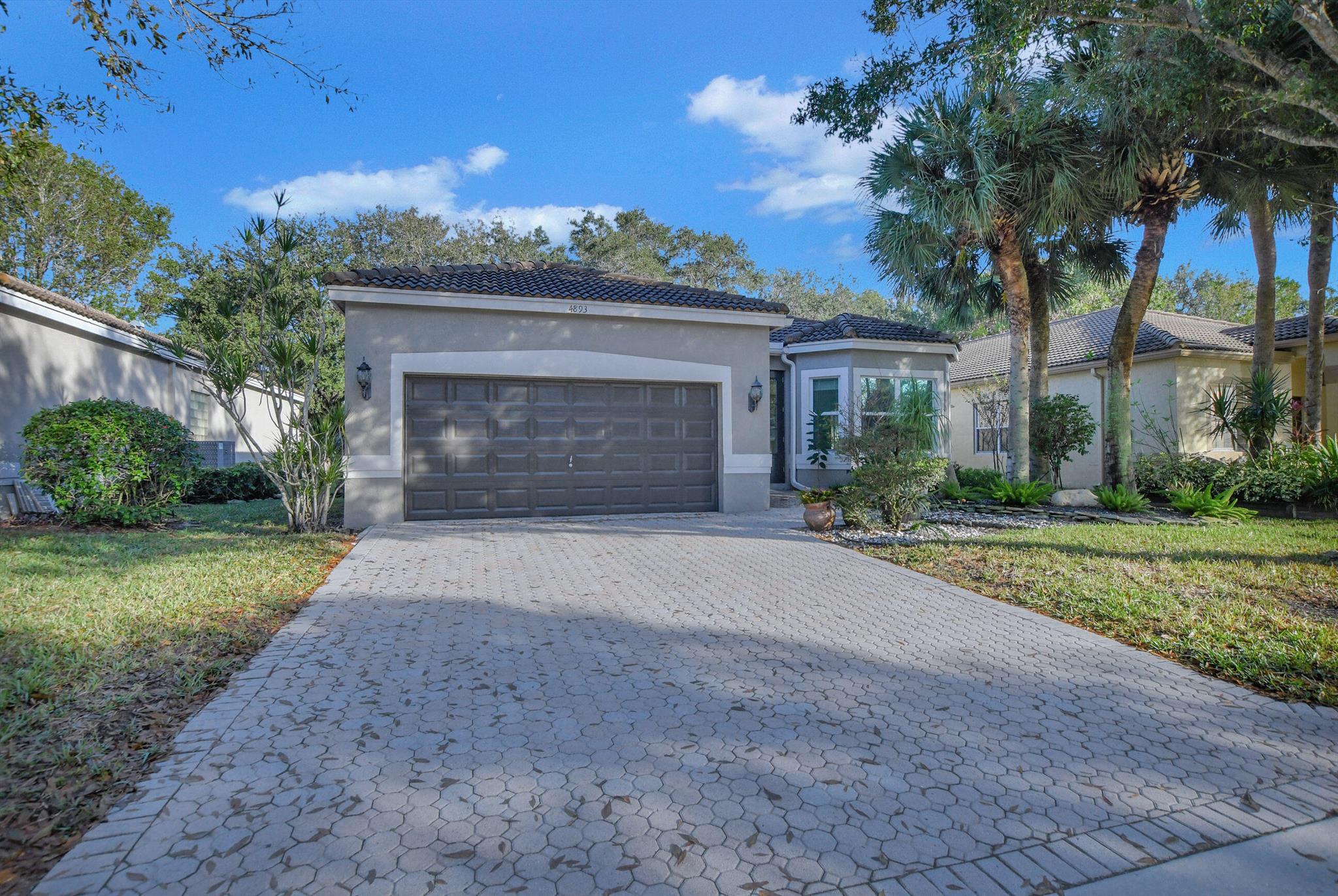 Pristine 3 bedroom 2 1/2 bath home in the desirable gated community of Victoria Isles. Home features bay windows, french doors, living/dining room, kitchen overlooking the family room. New stainless steel appliances and granite countertops. Includes spacious master bedroom, newly painted interior, alarm system, screened in patio and well landscaped front/back yard. Community has a common area CLUBHOUSE/POOL. Renter's insurance is required. Home is located close to the Florida Turnpike and Sawgrass Expressway. Close to great schools and less than 2 miles from The Promenade.