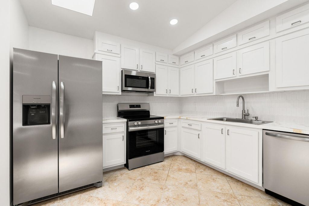 Photo of 1437 Captains Walk #21a, Fort Pierce, FL 34950 (MLS # R11014568)