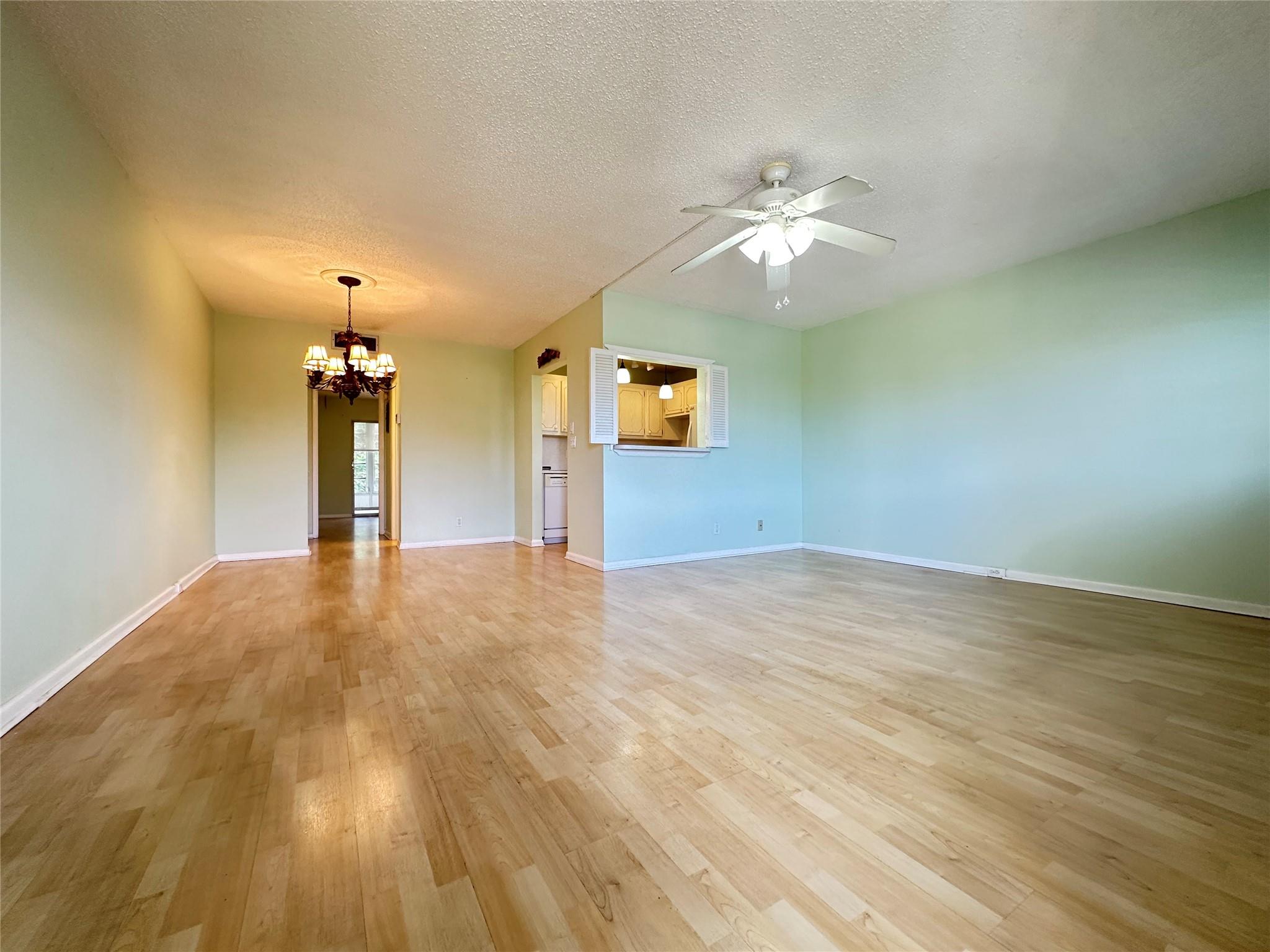 Great location! Walk to plaza, pool & clubhouse! Don't miss this amazing opportunity for a 1 bedroom, 1.5 bath in the coveted Cambridge area for a FANTASTIC PRICE! Unfurnished & ready for you to make it your own, this condo has lam floors, plantation shutters in liv rm, a walk-in shower in prim bathroom, AC 2021 & Water Heater 2019! The 8' encl patio has a lg storage closet & overlooks a nice garden view! Community BBQ picnic area w view of lake! Come enjoy this active adult gated community w/24 hr sec, free busses, 15 pools, pickleball, tennis, putting green & a lavish clubhouse w/gym, classes, clubs, theater, free movies, billiards, ping pong, indoor & outdoor pools, cafe, & much more! Close to shopping, restaurants, highways & Deerfield Beach! THIS ONE WILL GO FAST! Assoc. Claims 55+