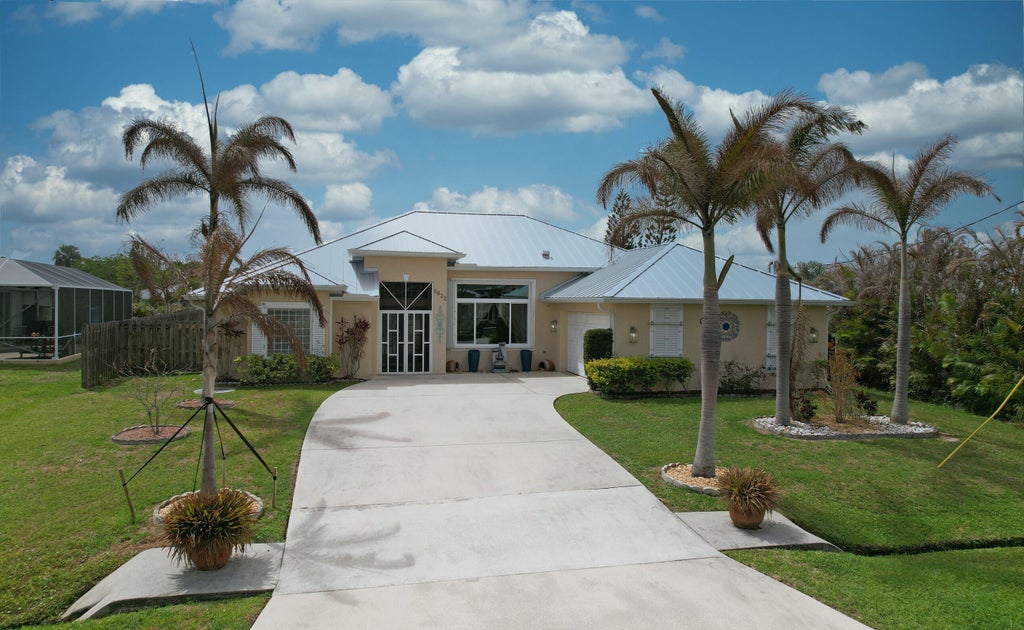 Photo of 5822 NW Bates Avenue, Port Saint Lucie, FL 34986 (MLS # B26073986)