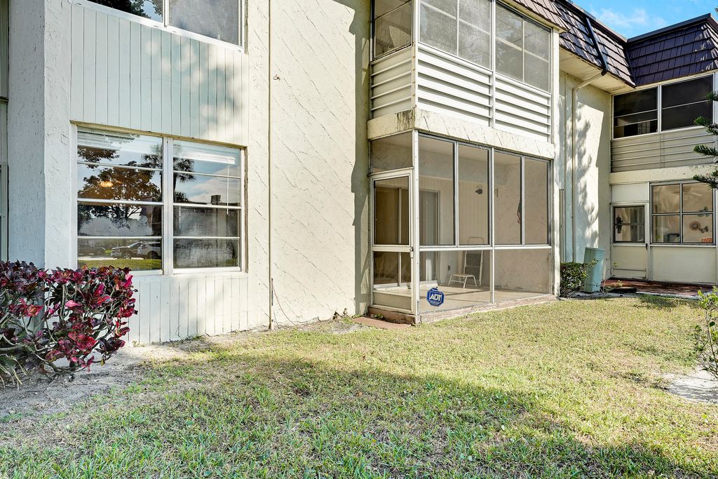 Photo of 12003 Poinciana Boulevard #105, Royal Palm Beach, FL 33411 (MLS # R11150669)