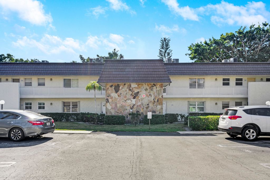 Photo of 12003 Poinciana Boulevard #105, Royal Palm Beach, FL 33411 (MLS # R11150669)