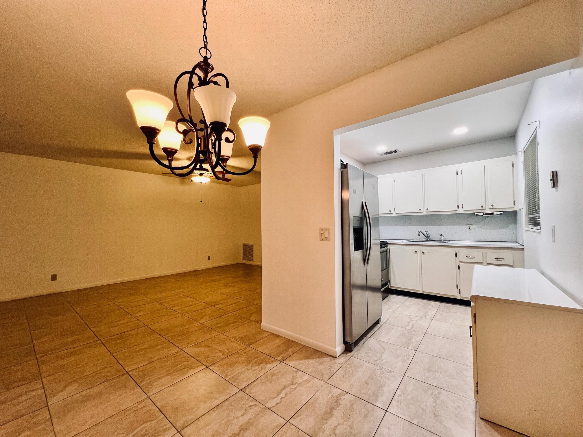Desirable Corner Condo in 55+ Century Village! Beautifully Maintained With Updates to Kitchen & Baths. Freshly Painted Interior. Neutral Tile Flooring Throughout. Long Enclosed Lanai With Tile Flooring and Storage Closet. Tucked Away Quiet Location Yet Central to the Kent Pool & Dorchester Pool. Lovely Building With Resident Patio and Lush Mature Landscaping. Century Village Is a Vibrant 55+ Community Centrally Located In Highly Desirable Palm Beach County! Enjoy An Active Lifestyle With Resort Style Amenities...