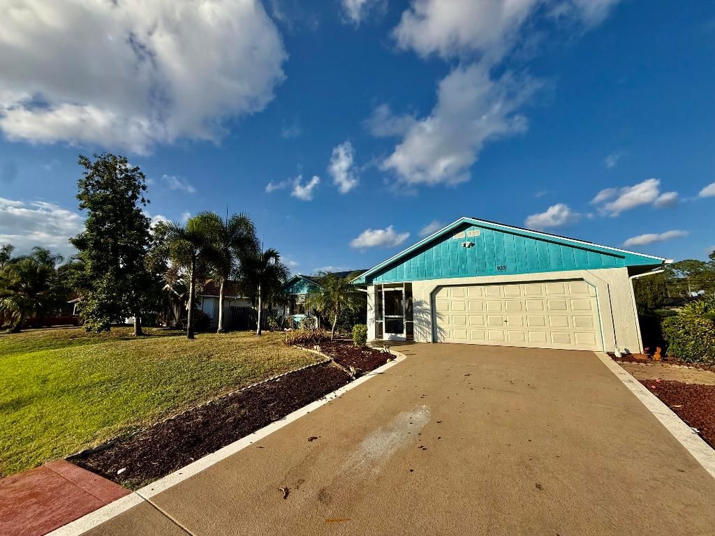 Photo of 933 SE Streamlet Avenue, Port Saint Lucie, FL 34983 (MLS # R11143581)