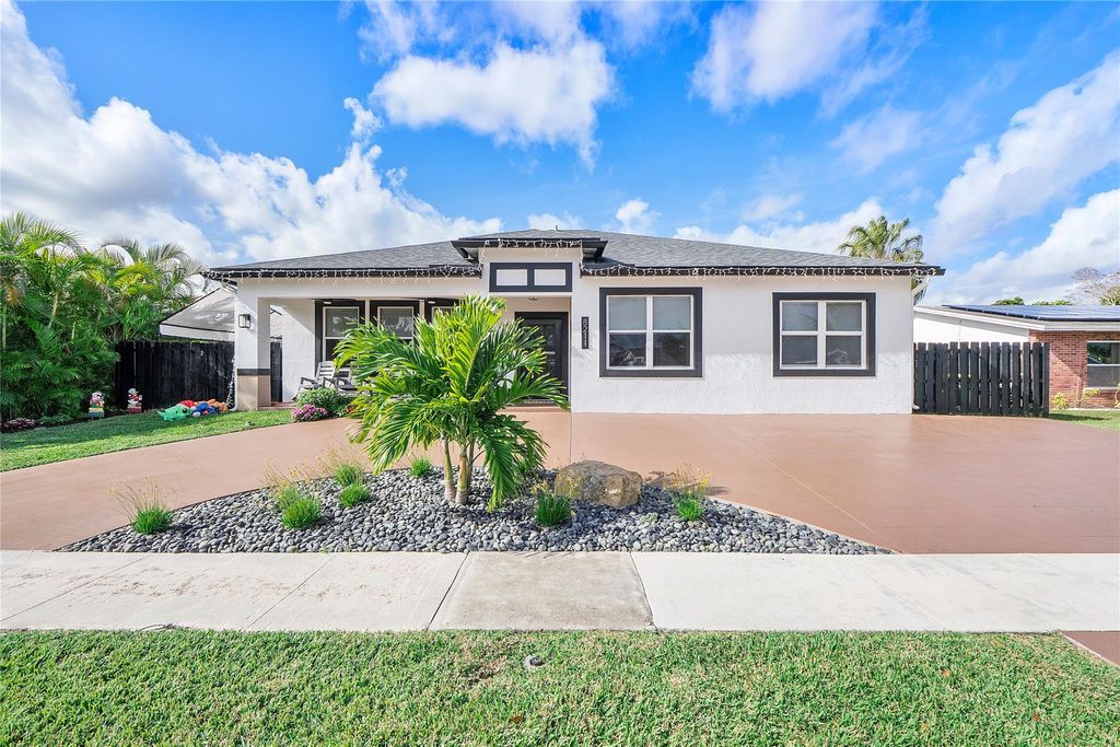 Photo of 8211 NW 74th Ave, Tamarac, FL 33321 (MLS # F10541499)