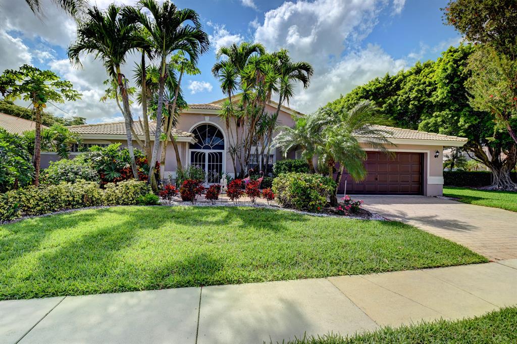 Spectacular and spacious Lakefront ranch. Split floor plan. No stairs here!Largest 3 bedroom in community. Original model was extended when it was built. Large neutral stone tile wall to wall including all bedrooms. 42'' white cabinets with designer granite counters and full backsplash.Lots of high hats, niches and built ins. Situated on an oversized prime lot with easy access to club and pool! Literally a few steps right out your door and into the club and pool. Absolutely does not interfere with your privacy at all, simply the ultimate in convenience!Beautiful tree lined streets in this stately neighborhood. Maintenance includes24 hour manned guard,complete lawn and landscape care, pressure was roof, paint every 7 yrs, cable and active club. Westchester CC at your access not mandat