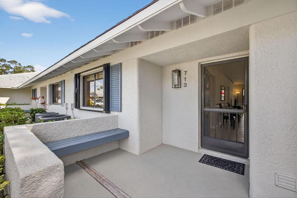 Photo of 713 Club Drive, Palm Beach Gardens, FL 33418 (MLS # R11152837)