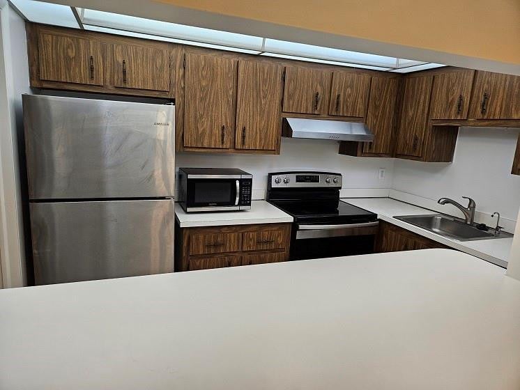 Photo of 4158 Inverrary Drive #106, Lauderhill, FL 33319 (MLS # B26065795)