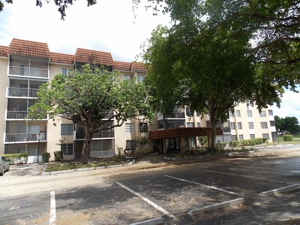 Photo of 4158 Inverrary Drive #106, Lauderhill, FL 33319 (MLS # B26065795)