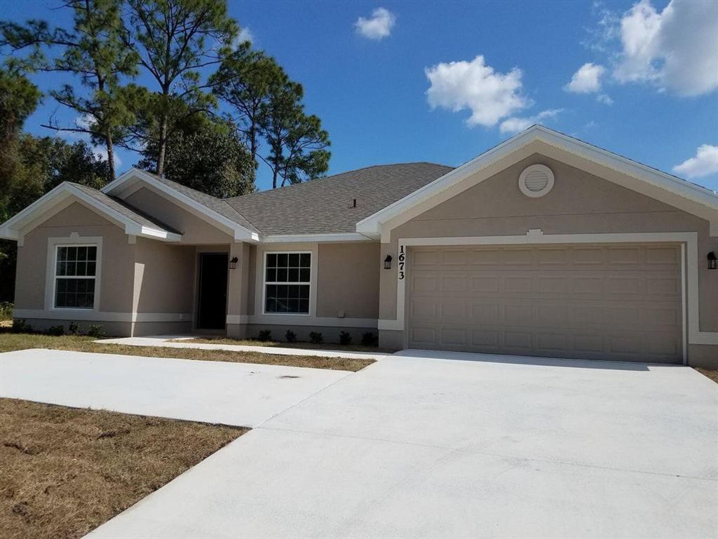 Photo of 1317 SE Sandia Drive, Port Saint Lucie, FL 34983 (MLS # R10769237)