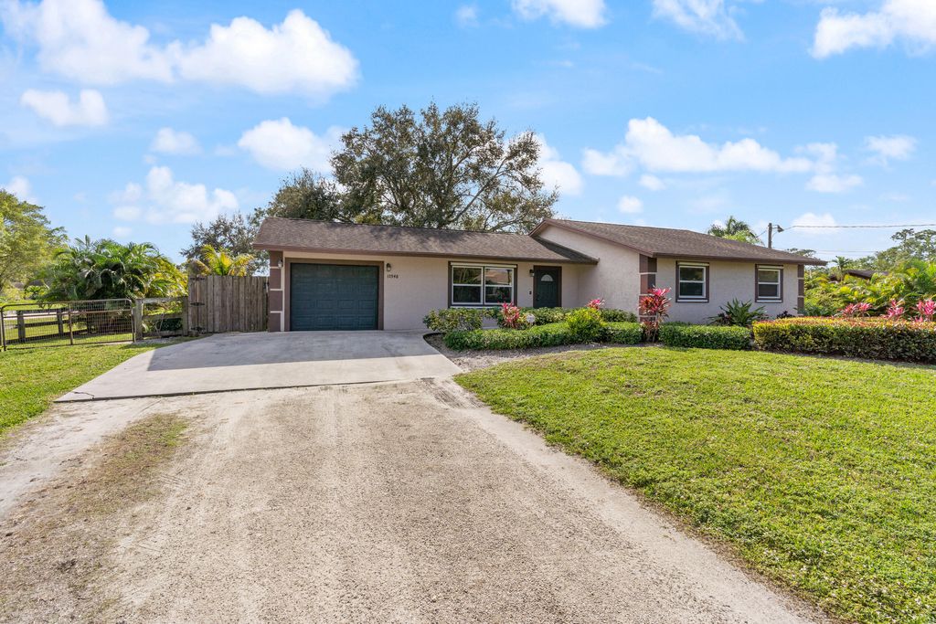 Photo of 11546 59th Street N, West Palm Beach, FL 33411 (MLS # R10954359)