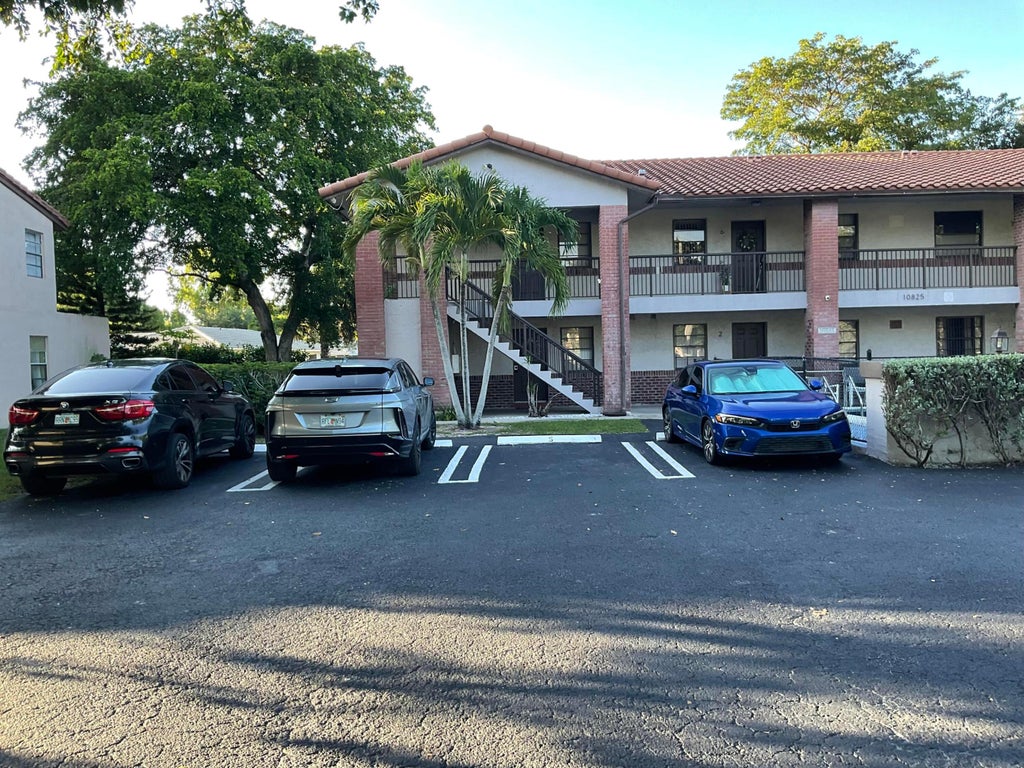 Photo of 10825 Royal Palm Boulevard #1-8, Coral Springs, FL 33065 (MLS # B26006863)