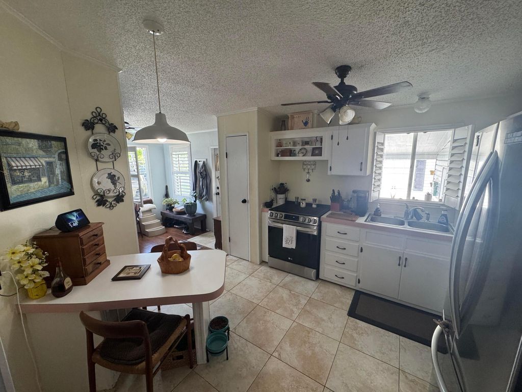Photo of 5680 Boca Chica Court, Fort Pierce, FL 34982 (MLS # B26000921)