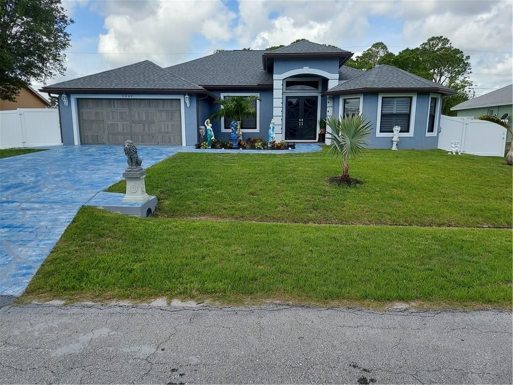Photo of 3942 SW Helmlinger St, Port St Lucie, FL 34953 (MLS # F10379964)