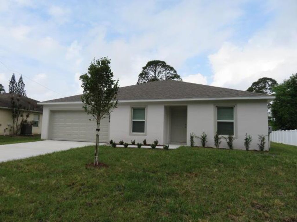 Photo of 1834 SW Lennox Street, Port Saint Lucie, FL 34953 (MLS # R10696840)