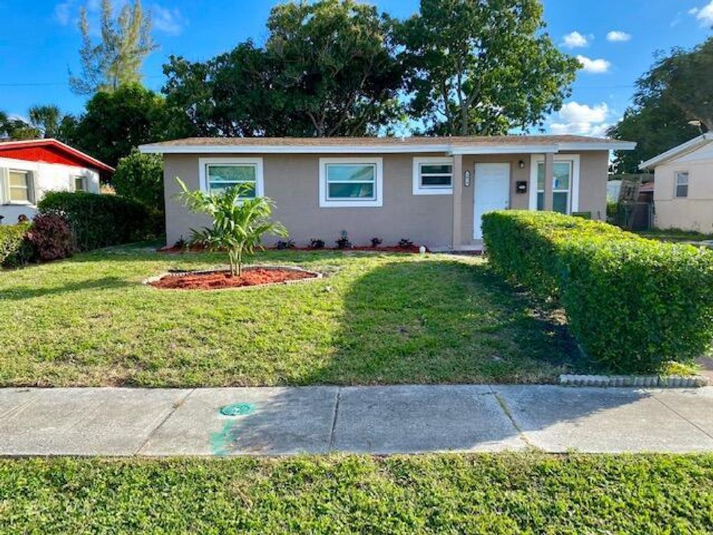 Photo of 1410 7th Street, West Palm Beach, FL 33401 (MLS # R10781501)