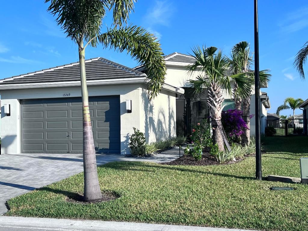 Photo of 13269 SW Blue River Road, Port Saint Lucie, FL 34987 (MLS # R11130521)