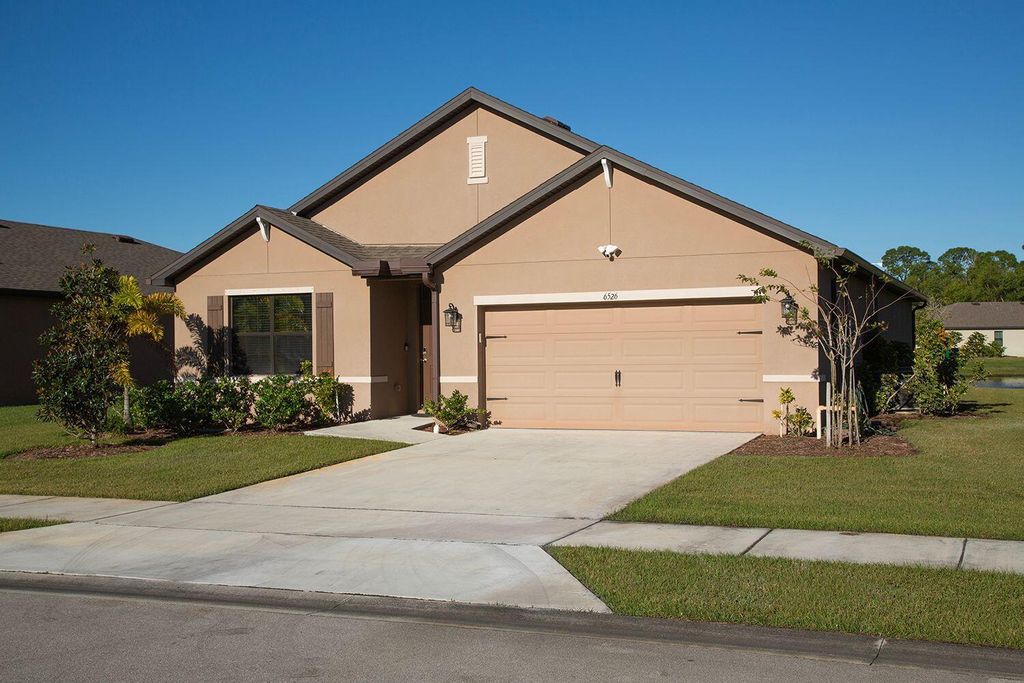 Photo of 6526 NW Oaklawn Way, Port Saint Lucie, FL 34983 (MLS # R11040567)
