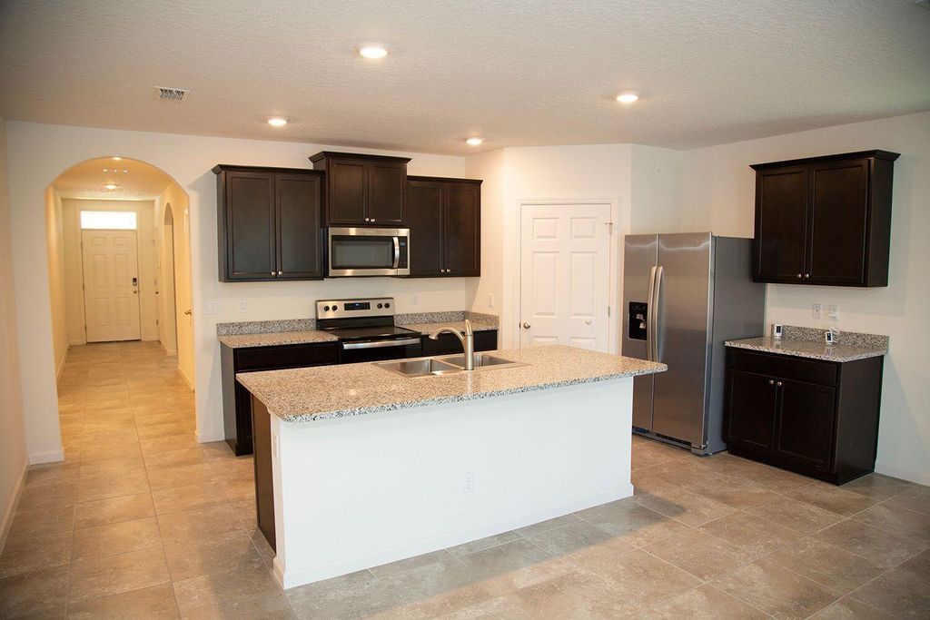 Photo of 6526 NW Oaklawn Way, Port Saint Lucie, FL 34983 (MLS # R11040567)