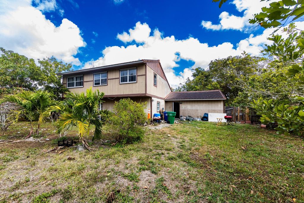Photo of 4404 NW 75th Terrace, Coral Springs, FL 33065 (MLS # F10555912)