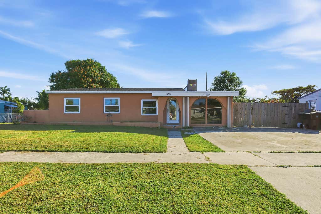 Photo of 333 Mid Pines Road, Palm Springs, FL 33461 (MLS # B26051204)