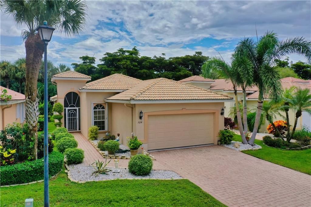 Photo of 7074 Via Genova, Delray Beach, FL 33446 (MLS # F10301218)