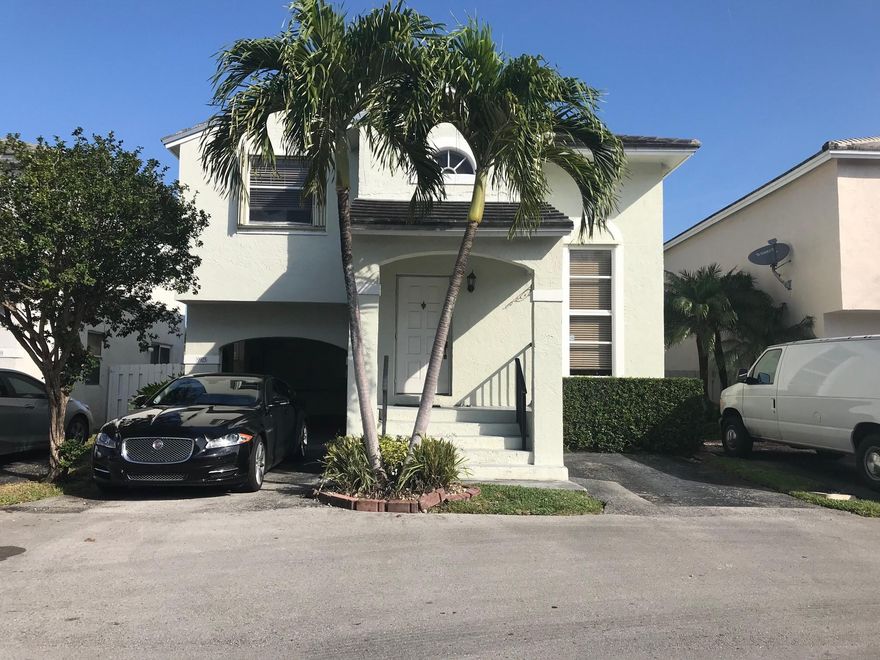 Welcome to this beautifully maintained 2-story home in the heart of Plantation, located in the desirable Jacaranda community. This 3-bedroom, 2.5-bath residence offers a perfect blend of comfort and style, featuring a spacious layout with updated finishes throughout. Enjoy peace of mind with a newer A/C (2 years), new water heater (1 year), and a roof in excellent condition. Stainless Steel appliances. Relax in your private backyard oasis overlooking a tranquil canal with breathtaking sunset views, an additional side patio and a cozy Florida den offer extra space for relaxation. Residents have access to the well-maintain pool. Conveniently located near top-rated schools, shopping, dining, and major highways, this home is a true gem in one of Plantation's most sought-after neighborhoods.