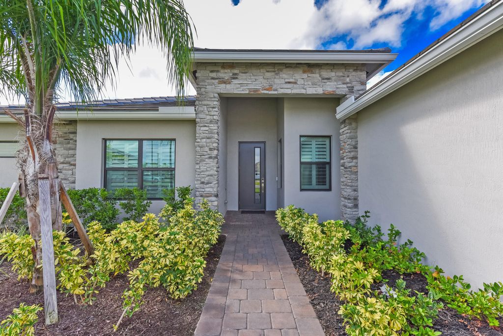 Photo of 1380 SW Lago Circle, Palm City, FL 34990 (MLS # R11127171)