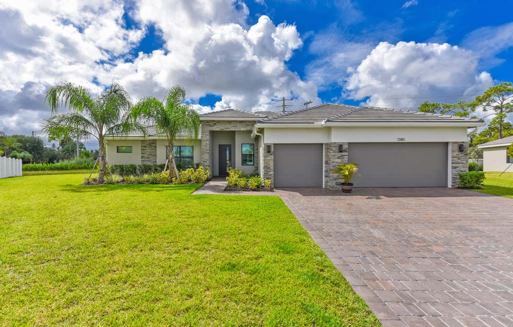 Photo of 1380 SW Lago Circle, Palm City, FL 34990 (MLS # R11127171)