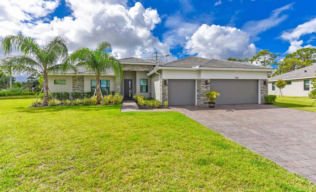 Photo of 1380 SW Lago Circle, Palm City, FL 34990 (MLS # R11127171)
