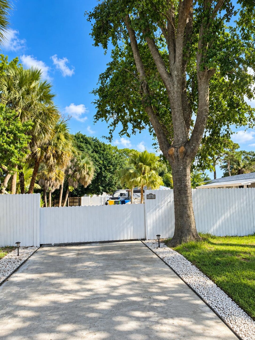 Photo of 5163 CLUB Road, Haverhill, FL 33415 (MLS # B26078493)