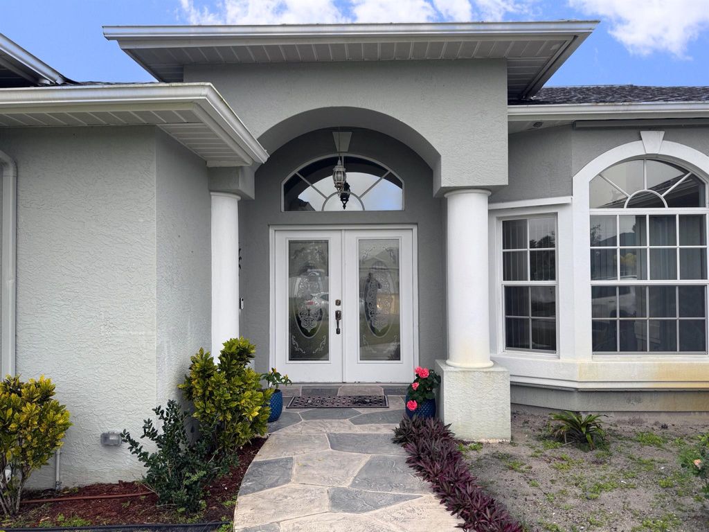 Photo of 124 SW Ladybug Drive, Port Saint Lucie, FL 34953 (MLS # R11055256)