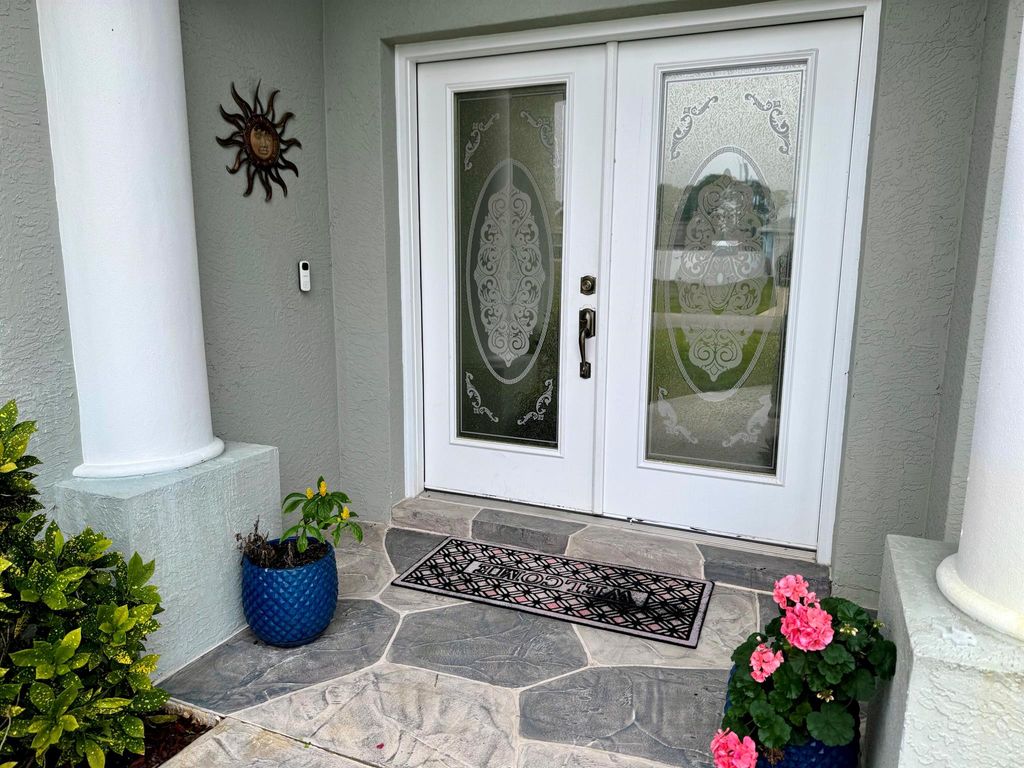 Photo of 124 SW Ladybug Drive, Port Saint Lucie, FL 34953 (MLS # R11055256)