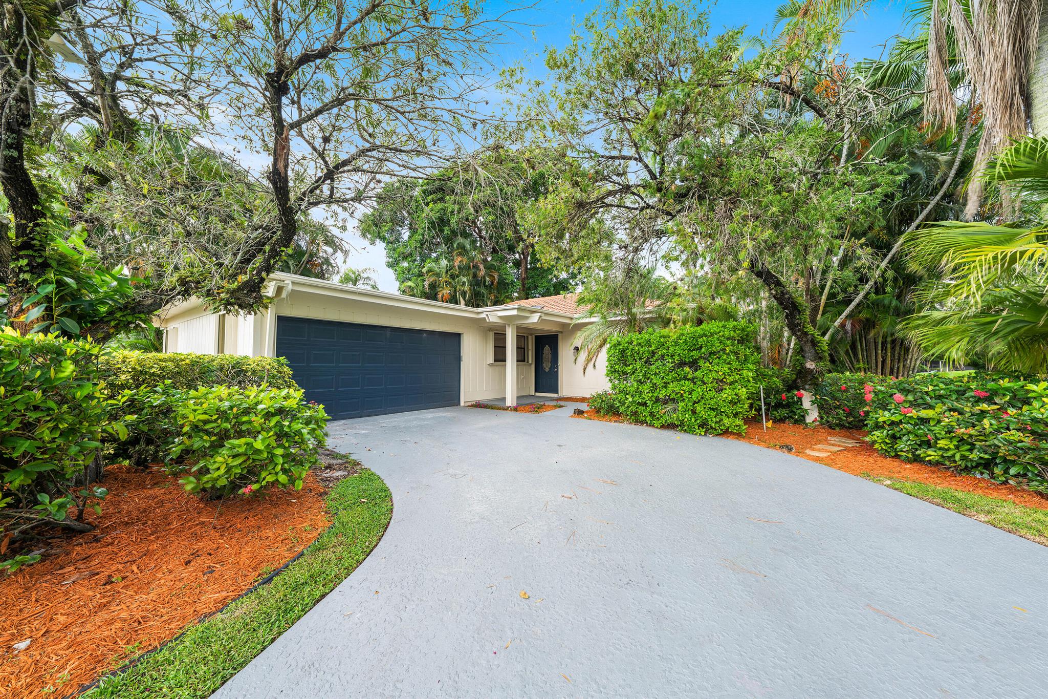 Renters Buyers! Discover your dream home in the exclusive Eastpoint Country Club! This stunning 3-bedroom home has been fully renovated from top to bottom. Step into a designer kitchen featuring quartz countertops and brand-new appliances, perfect for your culinary adventures. You'll love the gorgeous new flooring and stylish lighting throughout, along with beautifully redone bathrooms. The home boasts abundant natural light, adding warmth and vibrancy to each room. An extra-large garage provides plenty of storage, and accordion shutters offer peace of mind. Plus there is a huge private screened patio in the backyard. Don't miss out on this gem!