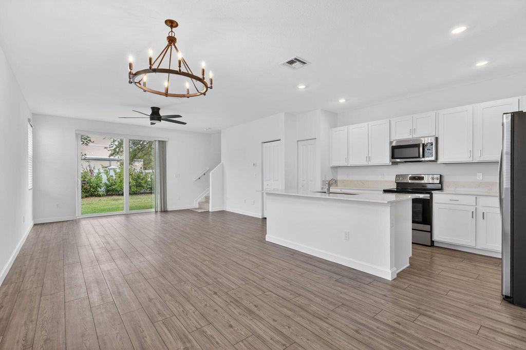 Photo of 211 SE Woodbark Street, Port Saint Lucie, FL 34984 (MLS # B26009600)