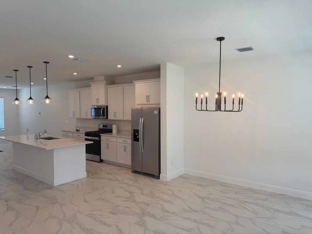 Photo of 857 SW Heirloom Walk, Palm City, FL 34990 (MLS # B26023078)