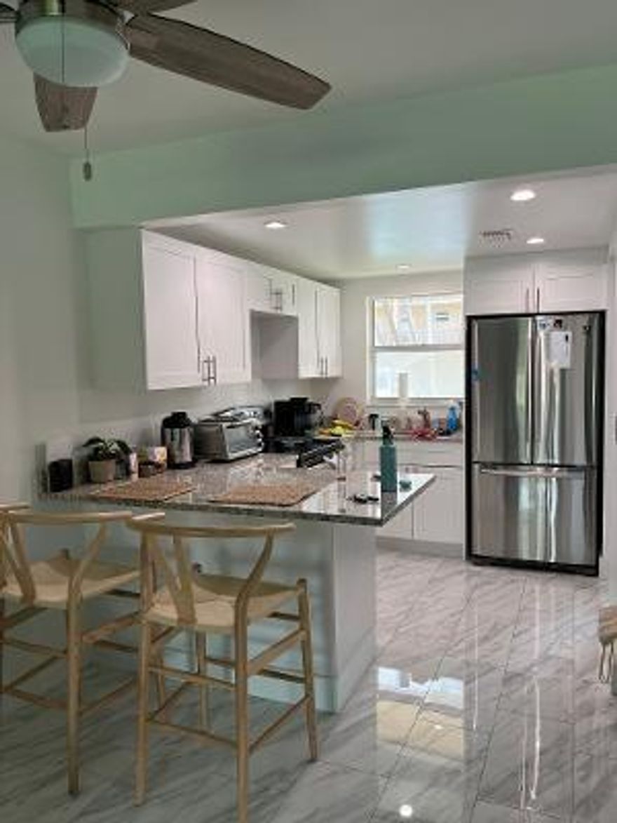 This unit has been completely remodeled.Nice garden view.Complex has club house and pool.