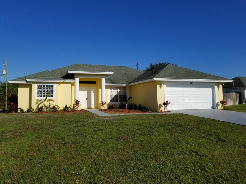 Photo of 425 SW Mccomb Avenue, Port Saint Lucie, FL 34953 (MLS # R11005154)