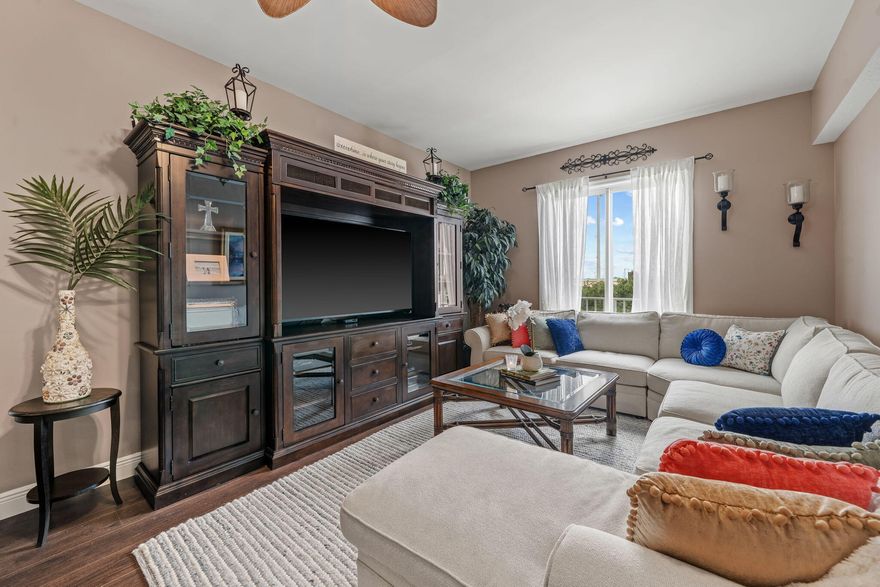 Beautifully updated and move-in ready condo in the heart of Abacoa! This light-filled 3rd-floor unit features brand new wood flooring throughout, a new A/C, new refrigerator, updated double oven/range, and refreshed bathroom fixtures for a clean, modern feel. Ideally located just steps from Roger Dean Stadium—enjoy spring training, year-round baseball, and vibrant nightlife. Walk to Downtown Abacoa restaurants, cafés, and entertainment. Close to premier golf courses, shopping, and Jupiter's beautiful beaches. Perfect as a primary residence, seasonal getaway, or investment opportunity! Enjoy a beautiful Florida lifestyle!