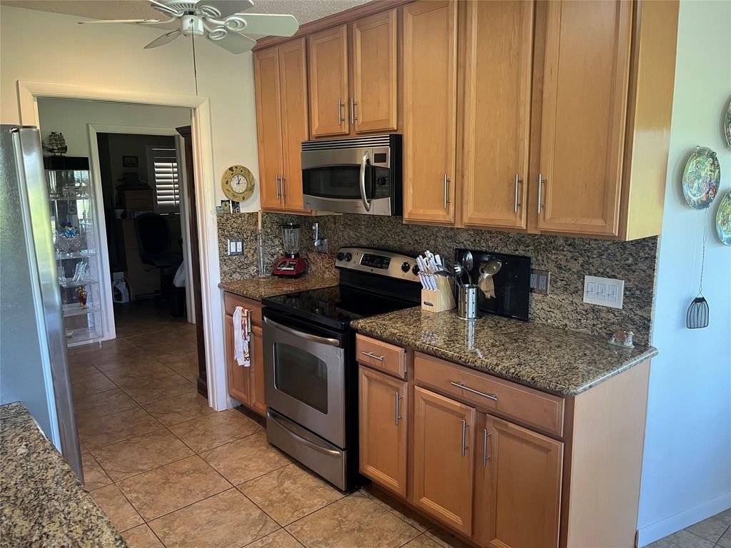 Photo of 5728 S Bayberry Ln, Tamarac, FL 33319 (MLS # F10533885)