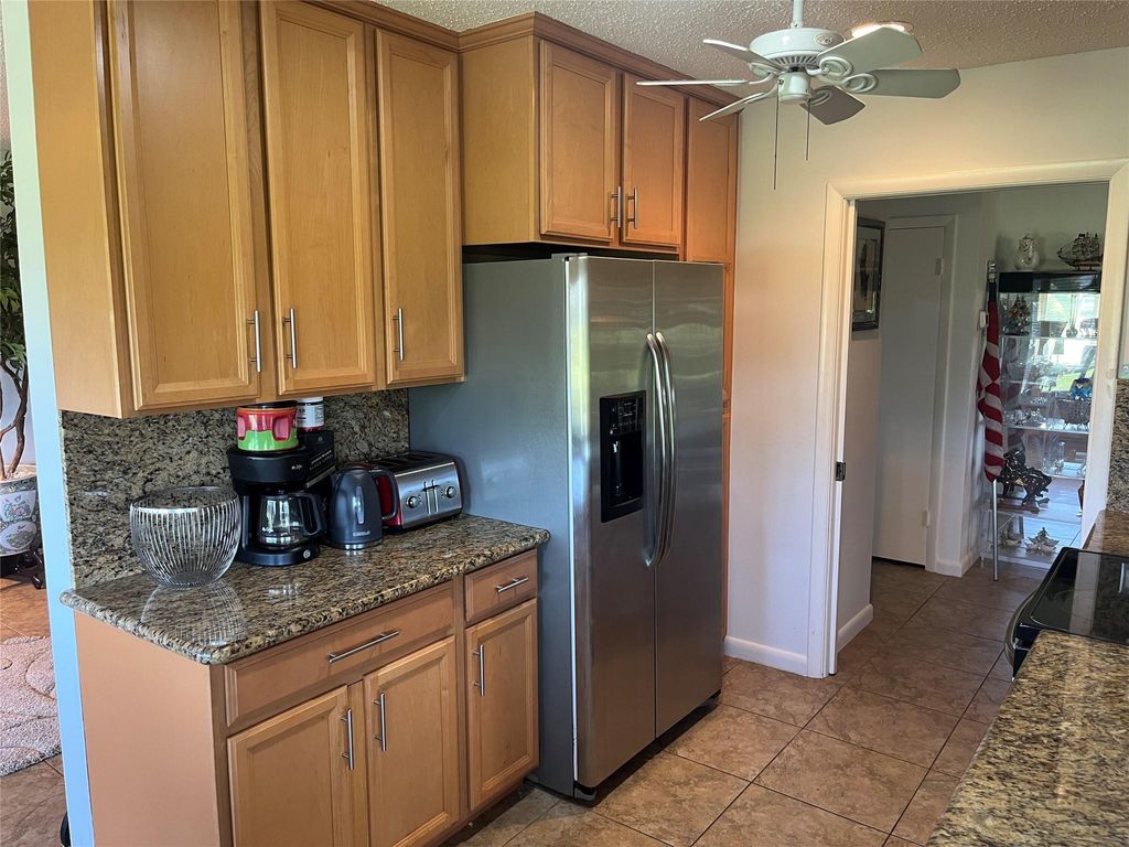 Photo of 5728 S Bayberry Ln, Tamarac, FL 33319 (MLS # F10533885)