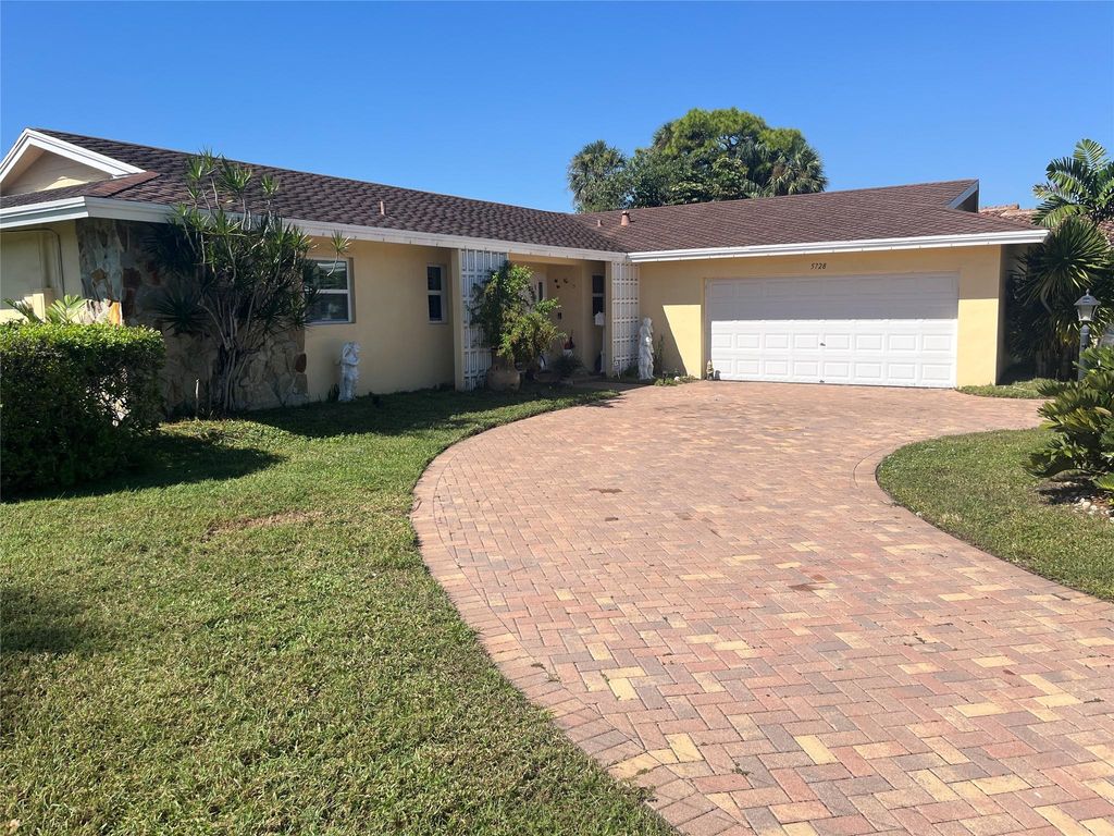 Photo of 5728 S Bayberry Ln, Tamarac, FL 33319 (MLS # F10533885)