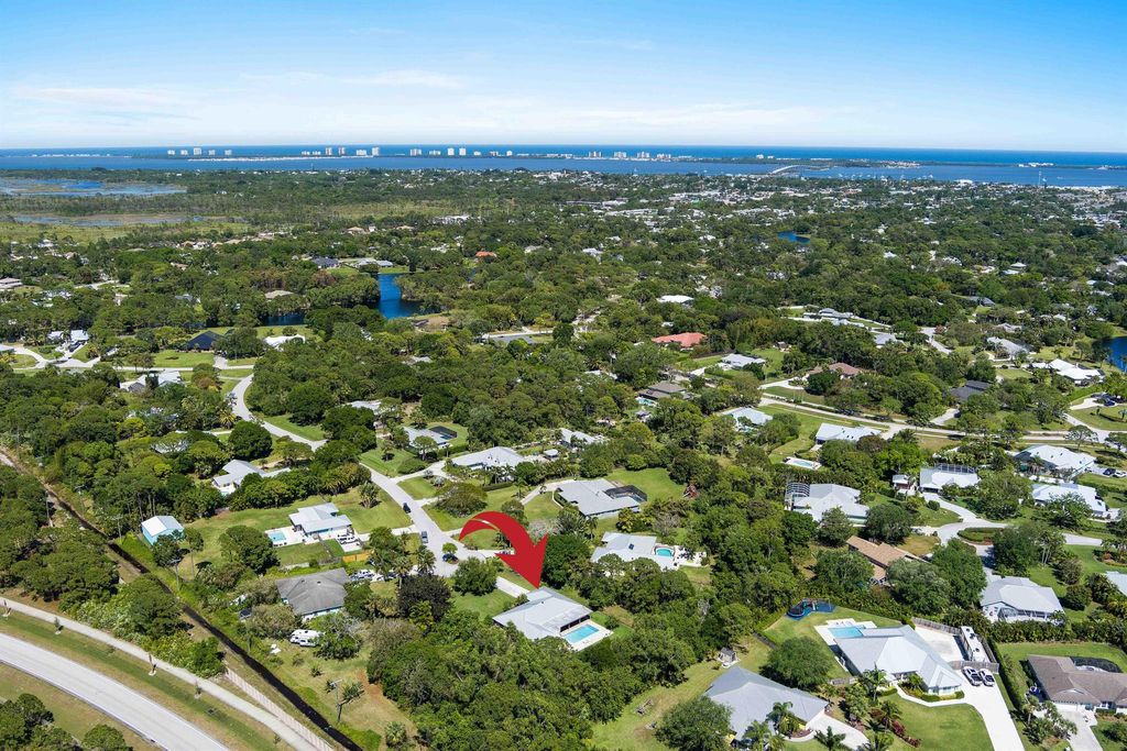 Photo of 2605 NE Cypress Lane, Jensen Beach, FL 34957 (MLS # R11073726)