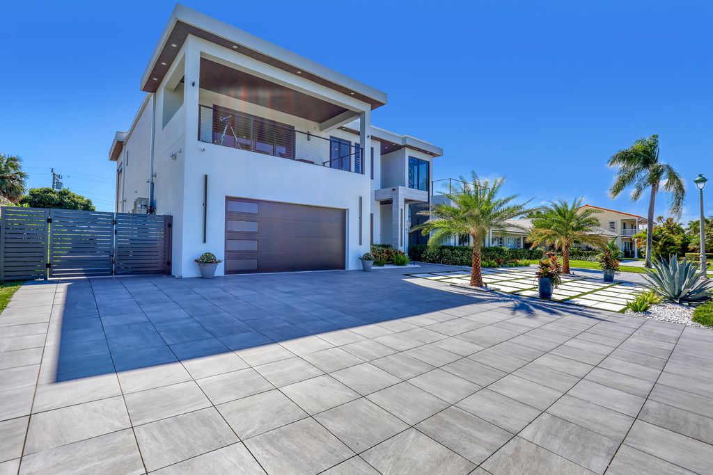 Photo of 1161 Pine Point Road, Riviera Beach, FL 33404 (MLS # R11159328)