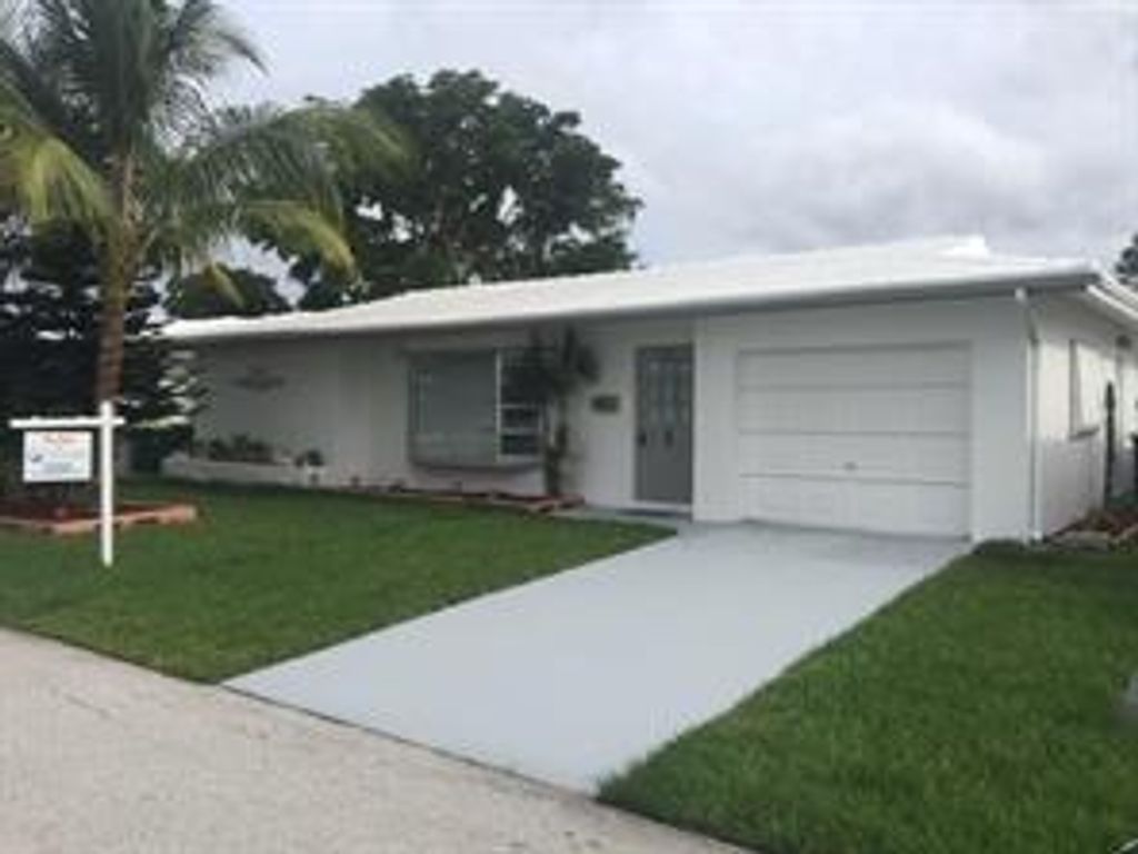 Photo of 6812 NW 74th Place, Tamarac, FL 33321 (MLS # B26018309)