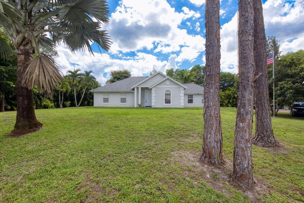 Photo of 13834 Persimmon Boulevard, Royal Palm Beach, FL 33411 (MLS # R11132813)