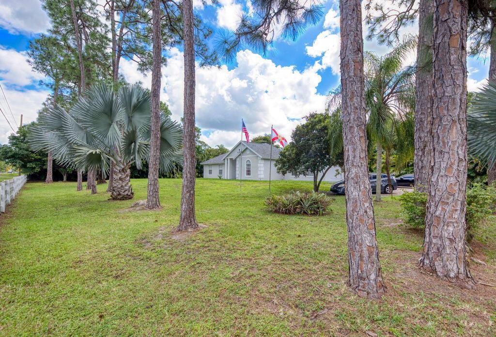 Photo of 13834 Persimmon Boulevard, Royal Palm Beach, FL 33411 (MLS # R11132813)