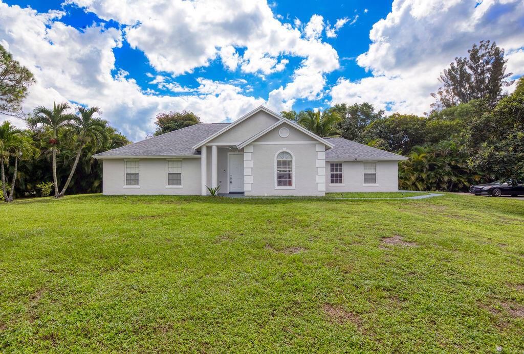 Photo of 13834 Persimmon Boulevard, Royal Palm Beach, FL 33411 (MLS # R11132813)