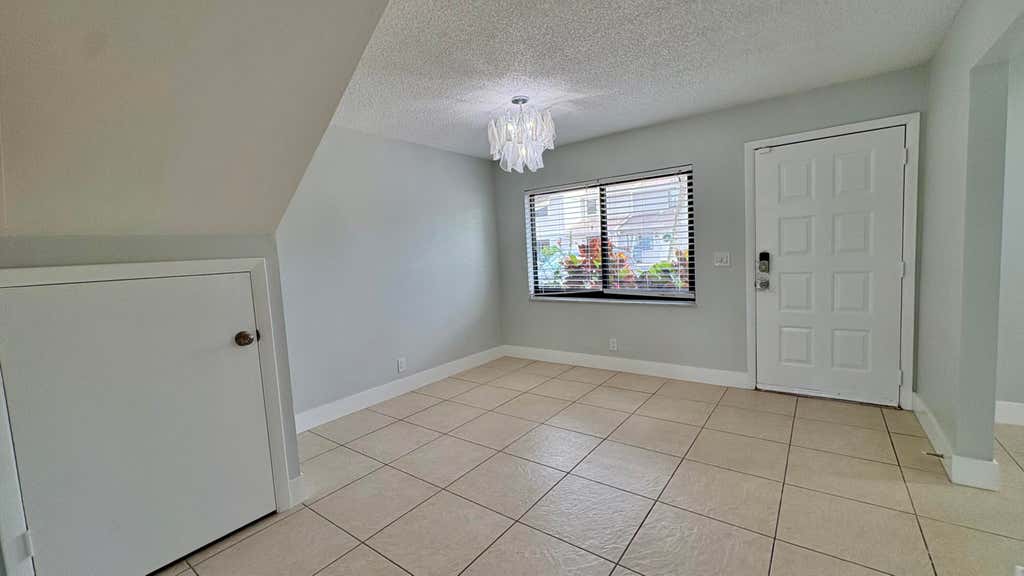 Photo of 5325 TENNIS Lane, Delray Beach, FL 33484 (MLS # B26061116)