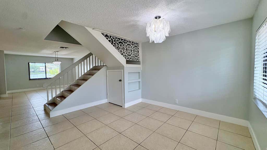 Photo of 5325 TENNIS Lane, Delray Beach, FL 33484 (MLS # B26061116)